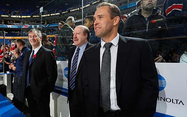 Sabres goalie coach Arturs Irbe (right) said about possibly playing, "Be careful what you wish for."